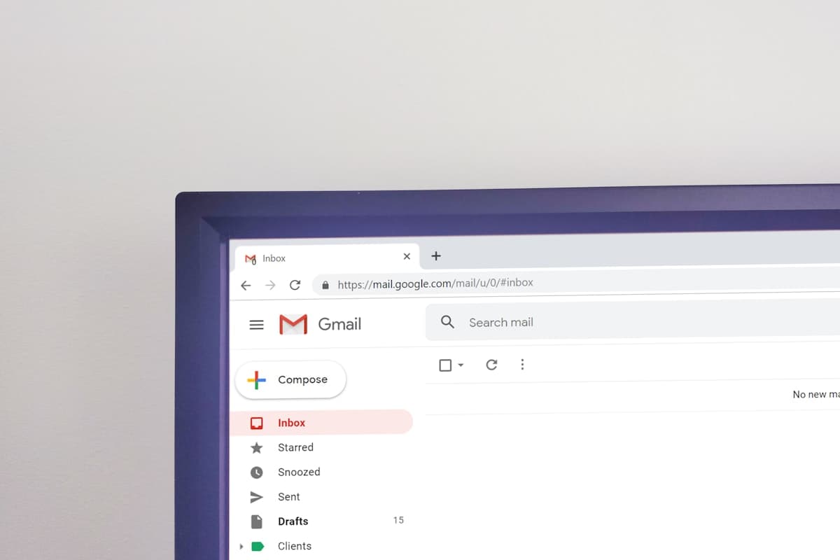 Email inbox interface on a laptop screen